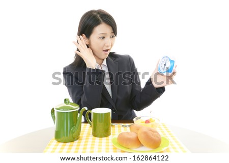 Portrait of Asian business woman who has no time