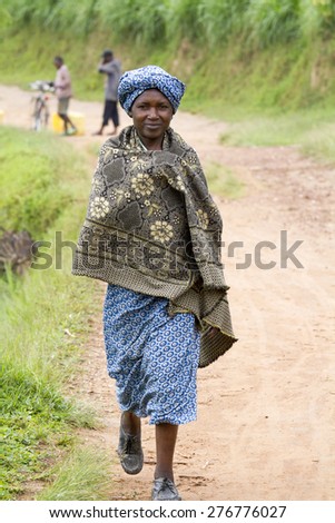 MAYANGE, RWANDA - NOVEMBER 4: Unidentified woman from the UN Millenium village at November 4, 2013. It is a village of returnees-who came back to Rwanda after the 1994 genocide.