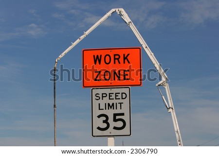 Traffic signs - Road Work and Speed - with crane in background
