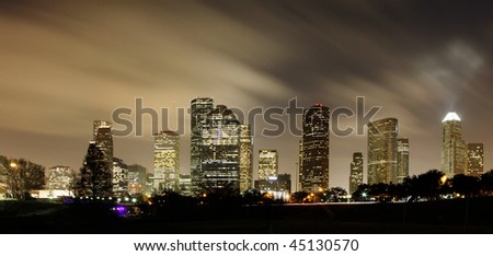Houston Skyline at night with beautifully lighted clouds
