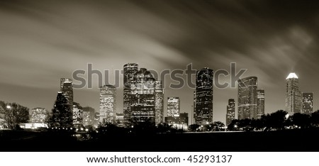 Houston Skyline at night with beautifully lighted clouds in Monochrome