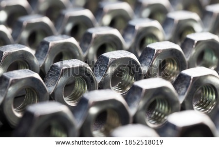 steel fasteners bolt nuts made of high-quality alloy steel and other elements for secure fastening of elements, nuts are used for fixing various elements, close-up nut Сток-фото © 