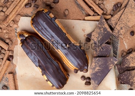 chocolate-covered custard eclair with creamy chocolate cream, custard cake eclairs with creamy filling and chocolate flavor ストックフォト © 