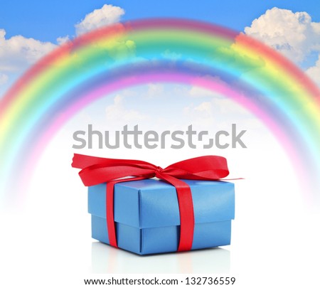 Gift boxes with bow rainbow blue summer sky