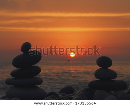 sunset zen sea stones