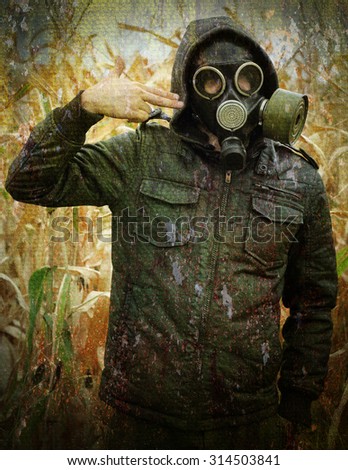man gas mask gun concept the danger of war rusty grunge background