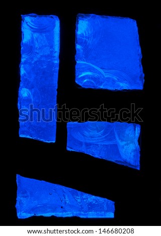 Detail of stained glass window made of blue chipped slab glass