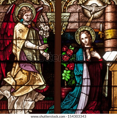 Stained glass window depicting Bible story of the Annunciation of Angel Gabriel to the Blessed Virgin Mary