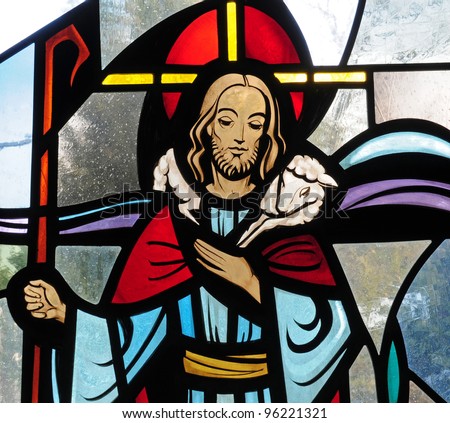 Detail of stained glass window of Jesus Christ as the Good Shepherd