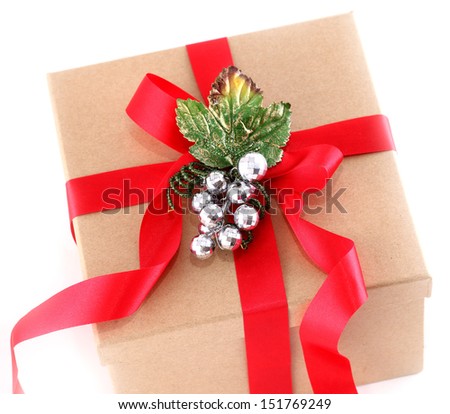 Brown paper gift box with red ribbon bow, isolated on white