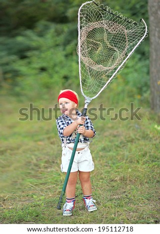 portrait of a little girl in a summer camp