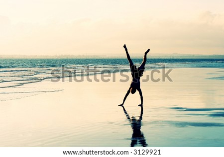 Cartwheel on a deserted beach