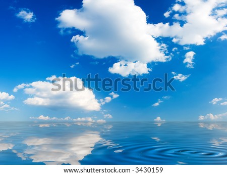 Panorama of blue cloudy sky above the ocean (can be used how background or wallpaper)