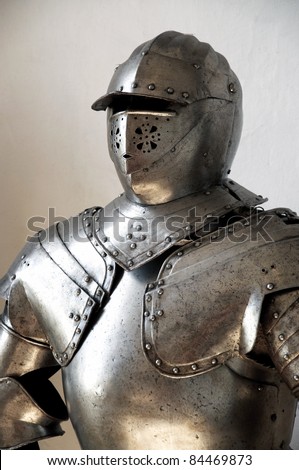 Closeup of a medieval knight\'s suit of armor and helmet