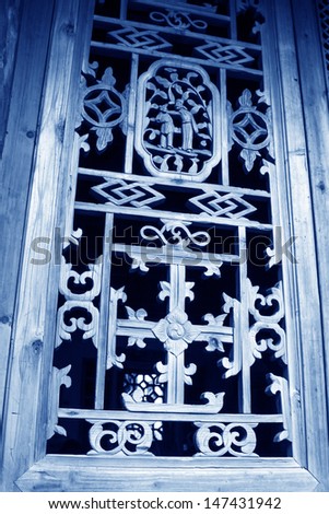 Carved window frames in the Phoenix Town, Hunan Province, south china