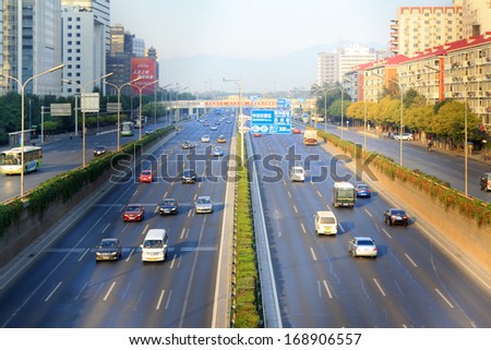 BEIJING - OCTOBER 6: The busy traffic flow in the ZhongGuanCun street, on october 6, 2012, beijing, china.