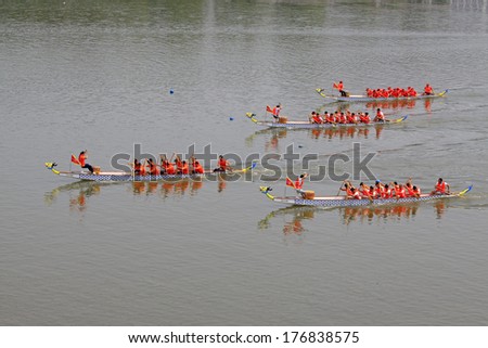 LUANNAN - JUNE 12: The dragon boat race scene in Chinese traditional Dragon Boat Festival on June 12, 2013, Luannan, Hebei Province, China.