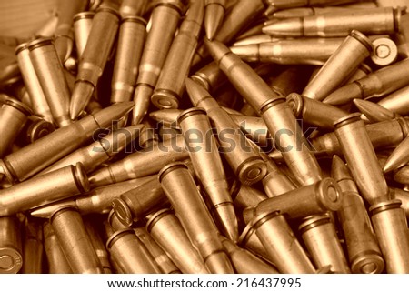 closeup of pictures, piles of rifle bullets