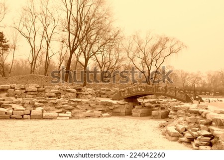 architecture landscape after the snow in the Old summer palace ruins park, Beijing, China