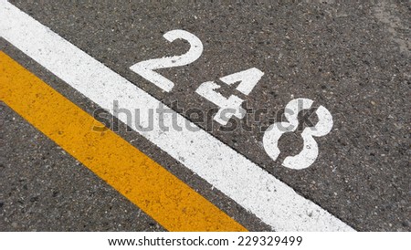 numbers on the road, closeup of photo