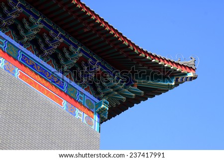 Chinese traditional building under the blue sky, closeup of photo