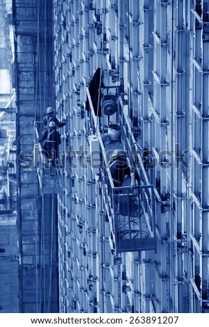 Luannan County, May 18: Construction workers in high rise building doing decoration works on May 18, 2012, Luannan County, Hebei Province, China