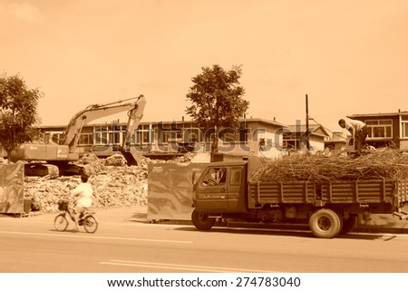 Luannan County, July 30: House demolition site, transportation of waste steel three yard car on July 30, 2012, Luannan, Hebei, China.
