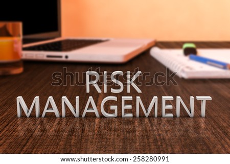 Risk Management - letters on wooden desk with laptop computer and a notebook. 3d render illustration.