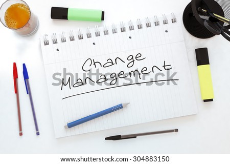 Change Management - handwritten text in a notebook on a desk - 3d render illustration.