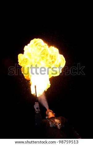 Fire explosion from an fire-breather in the Night