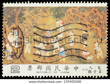 TAIWAN -CIRCA 1981: A stamp printed in Taiwan shows kids play around in the garden. Original Artist--Unknown. It is a collection of traditional Chinese painting of National Palace Museum, circa 1981