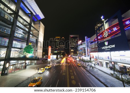 TAIPEI, TAIWAN - DECEMBER 21: Taipei modern city street at Xinyi financial district on December 21, 2014. It is one of the latest modern district in Taipei with Taipei 101 near by