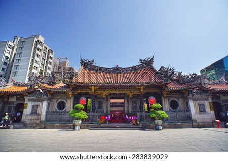 TAIPEI, TAIWAN - June 2, 2015: LongShan Temple on June 2, 2015. LongShan is one of the oldest and famous sacred temple at Taipei, Taiwan for local people and tourist.