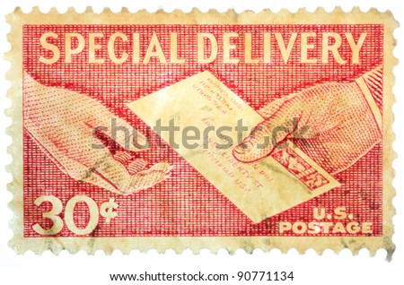 USA - CIRCA 1957:  A stamp printed in USA shows a mail been deliver from one to another.  Special Delivery service was very popular.  The service was once available from 7 am to midnight, circa 1957