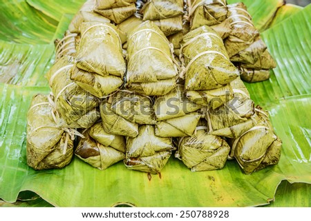 Traditional Thai food style, Glutinous rice steamed with banana wrap banana leaf ( Khao Tom Mat or Khao Tom Pad ) Thai dessert.