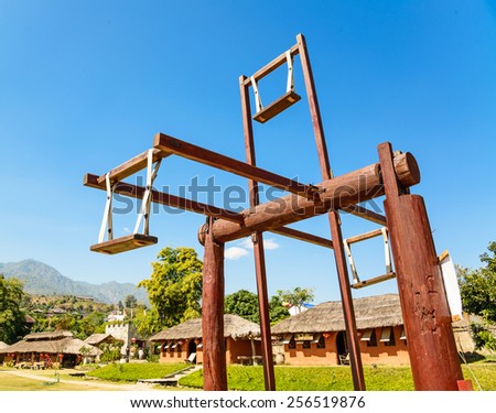 Hill tribes wooden swing at countryside of Thailand at Santichon village , Pai city, Mae Hong Son Province, Thailand
