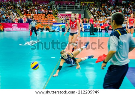 BANGKOK - AUGUST 16: Kayla Banwarth of USA Volleyball Team in action during The Volleyball World Grand Prix 2014 at Indoor Stadium Huamark on August 16, 2014 in Bangkok, Thailand.