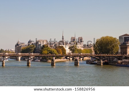 View of the Pont des Arts, Saint Louis island and Cite island over the Seine river, Paris, France