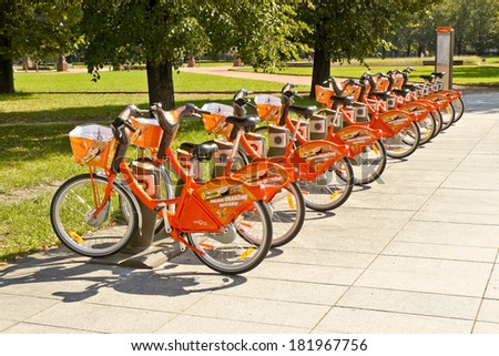 VILNIUS, LITHUANIA - AUGUST 17, 2013: Bikes for rent at the city self-serve bike station on the street of Vilnius.