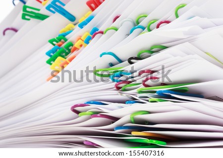 Pile of paper with colorful clips
