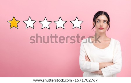 One star rating with young woman in thoughtful pose ストックフォト © 