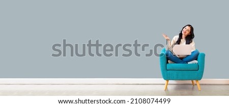 Similar – Image, Stock Photo Woman using her laptop at home.