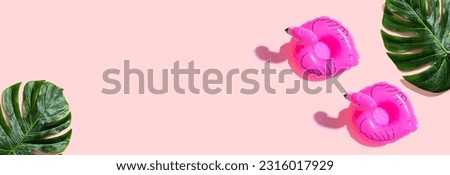 Similar – Image, Stock Photo Tropical flat lay of three vegan popsicle and half of ripe pineapple on cyan background