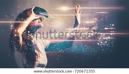 Digital Screen with young woman using a virtual reality headset 商業照片 © 