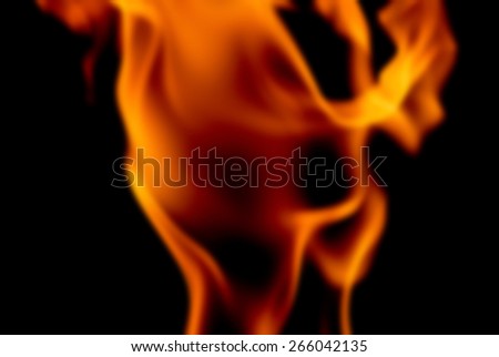 Blur Background Image of the Flames from a Torch at Night