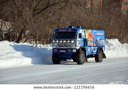 RUSSIA SAMARA - FEBRUARY 12: Truck for the rally-raid team KAMAZ MASTER on a straight road, Cup of Russia in winter track motor racing February 12, 2012 in Samara, Russia