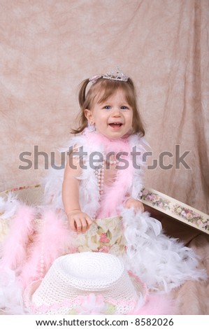Little Girl Playing Dress Up