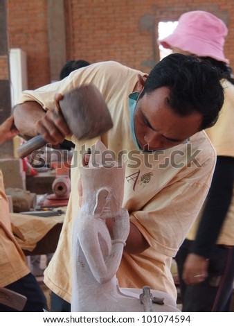 SIEM REAP - MARCH 24:Cambodian people are making crafts on March 24, 2012 in Siem Reap, Cambodia.Artisans d\'Angkor an artisan group trained by the Chantiers-Ecoles de Formation Professionnelle.