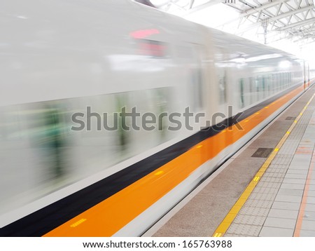 moving train in station
