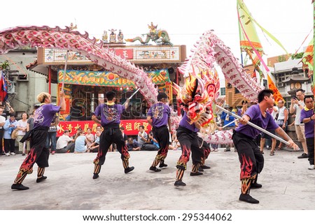 TAMSUI,TAIWAN- June 21:The Dragon Dance in Culture Festival of Tamsui Shing Shuei Yan on June 21,2015 in Tamsui,Taipei,Taiwan. The fair held annually for honor of the Ching-Shui Master.